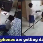 Small kid hits mother with a bat to snatch mobile phone