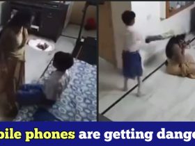 Small kid hits mother with a bat to snatch mobile phone